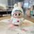 White labubu hat + white love sweater