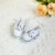 Small white canvas shoes